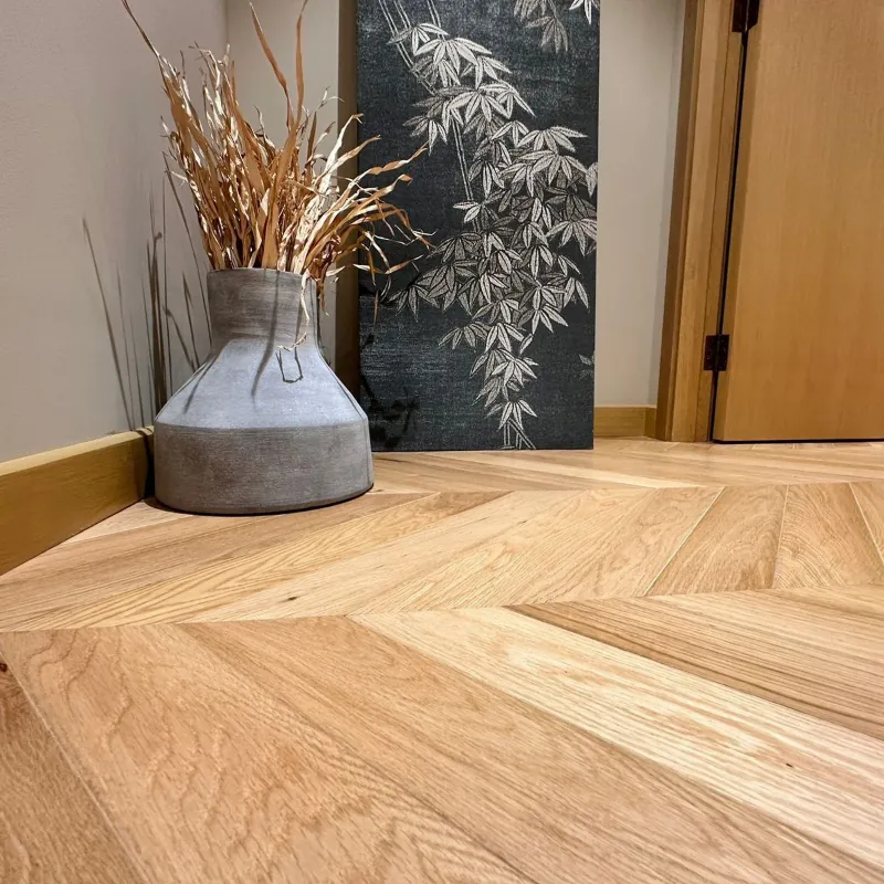 Detail of a Chevron pattern floor showing natural wood grain