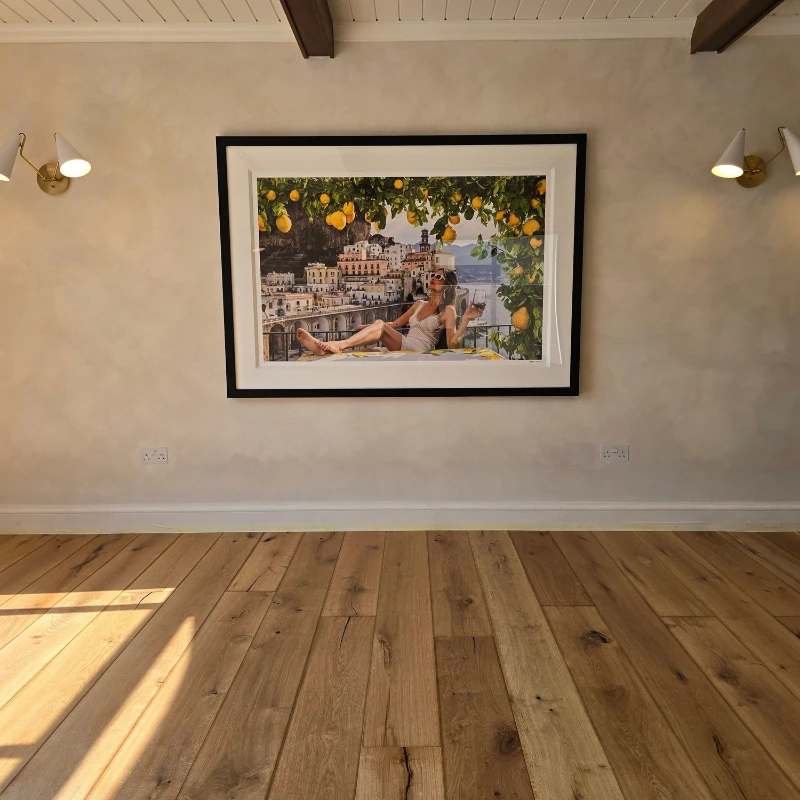 Rustic wide-plank oak flooring with visible natural character