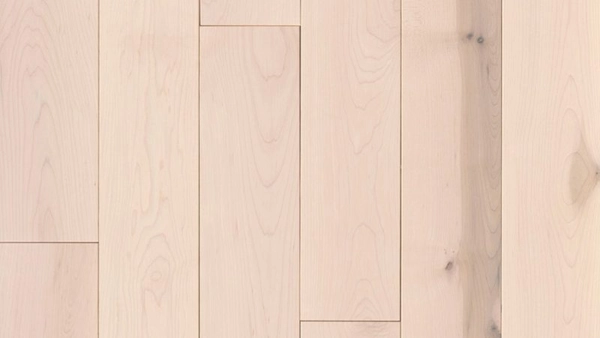 Top-down view of light maple wood floor planks