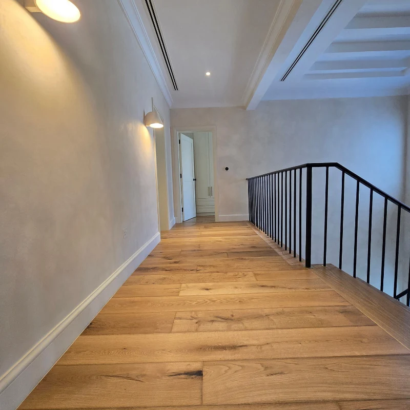 wide-plank oak flooring with visible natural characte